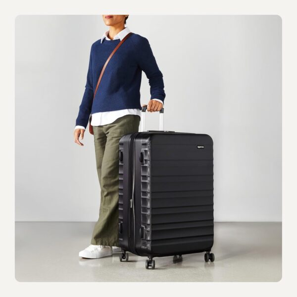 Amazon Basics 30" Hardside Large Checked Luggage, Hardshell Suitcase With Wheels, Expandable For Up to 15% More Space, With Scratch-Resistant Surface, Four Multi-directional Wheels, Black - Image 4